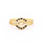 Anillo de plata de ley de 925 con tres aros trenzados con baño de oro y circonitas.