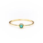 Anillo de plata de ley de 925 con baño de oro y turquesa.