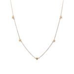 Gargantilla de plata de ley bañada en oro con estrellas.