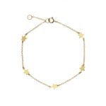 Pulsera de plata de ley bañada en oro con estrellas.